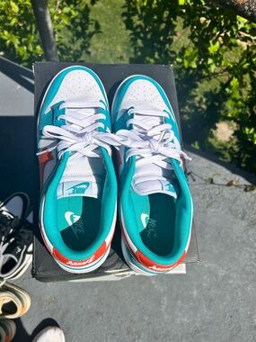 Nike Low-Top Sneakers in White Teal with Orange Trim